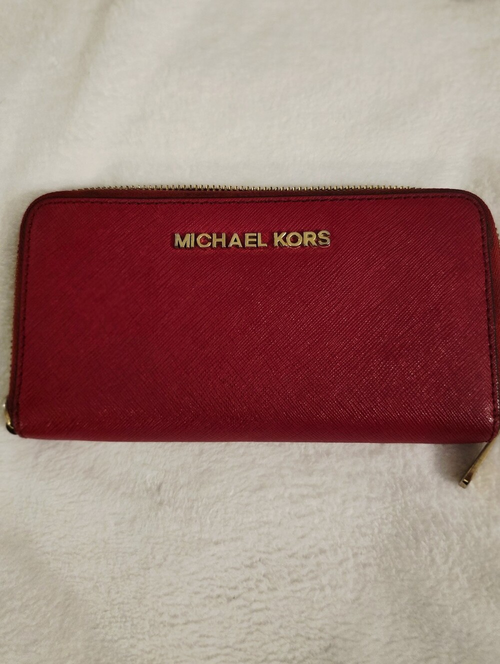 MICHAEL KORS Red Zip-Around Saffiano Leather Wallet.